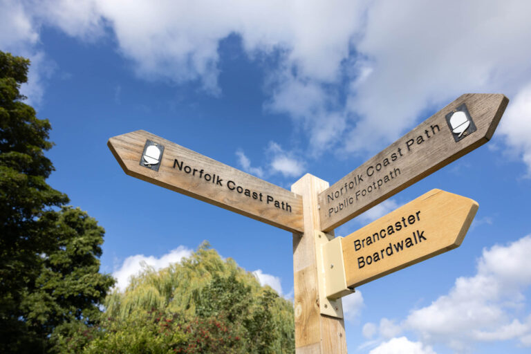 Finger posts showing the Norfolk Coast Path and Brancaster Boardwalk