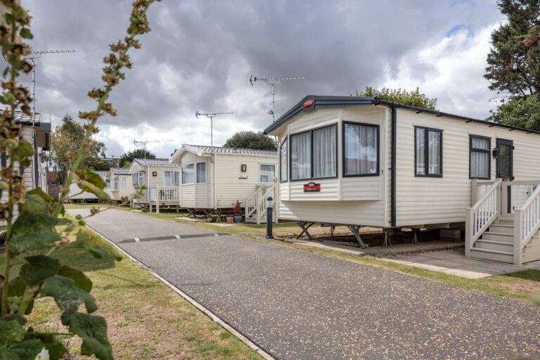 A row of static caravans on a neat and tidy park