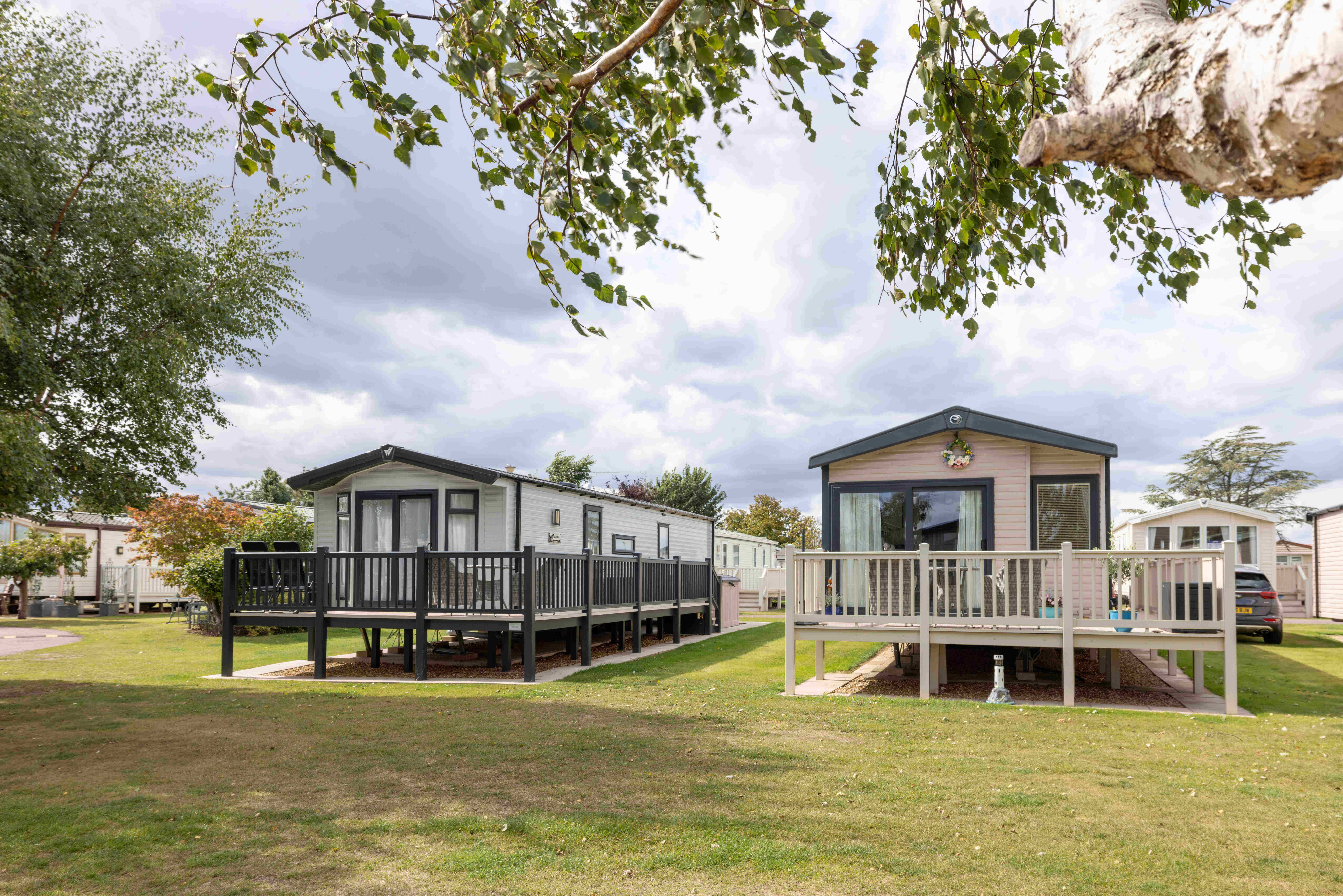 Caravan holiday homes with neat lawns between